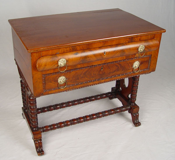 Appraisal: FLAME GRAIN MAHOGANY VICTORIAN WRITING TABLE Two drawers with the