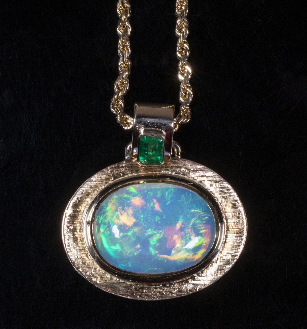 Appraisal: OPAL AND EMERALD PENDANT AND CHAIN K and K gold