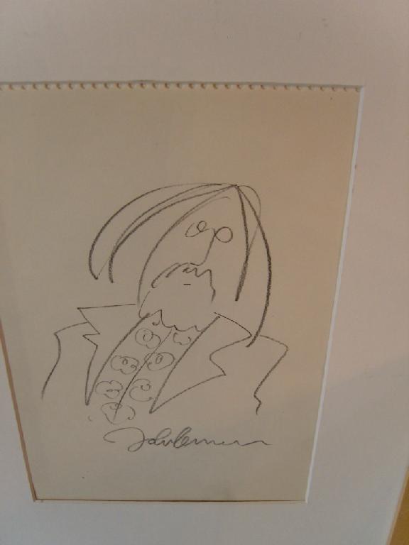 Appraisal: A pencil caricature drawing of John Lennon inscribed or signed