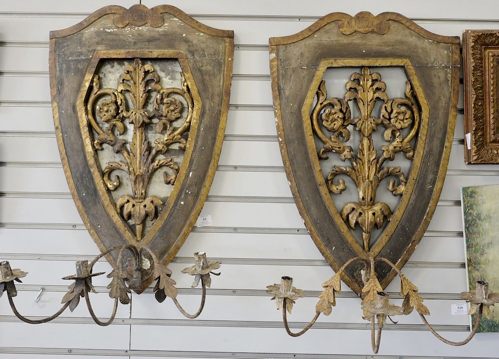 Appraisal: Pair of shield shaped decorative candle sconces with mirror backs