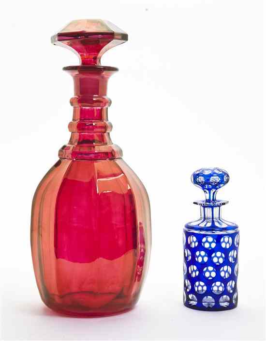 Appraisal: A Continental Glass Decanter of faceted baluster form with red