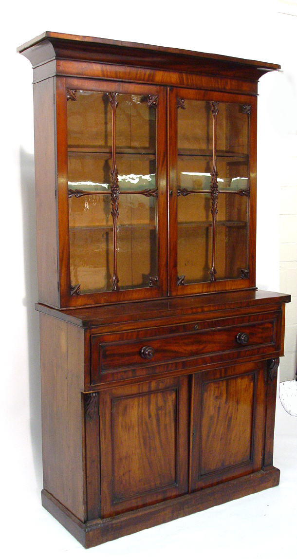 Appraisal: Early Victorian mahogany bookcase the moulded cornice above a pair