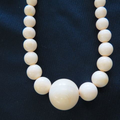 Appraisal: Carved Ivory Bead Necklace graduated beads to mm long