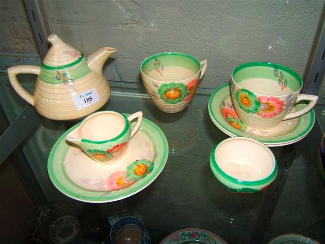 Appraisal: A Clarice Cliff teaset with green and pink flower designs