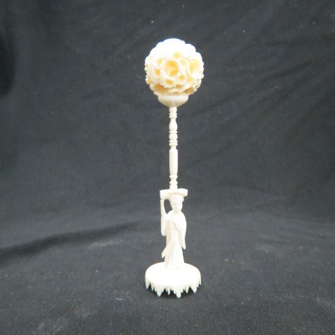 Appraisal: Chinese Carved Ivory Mystery Ball on Stand dragon decor figure