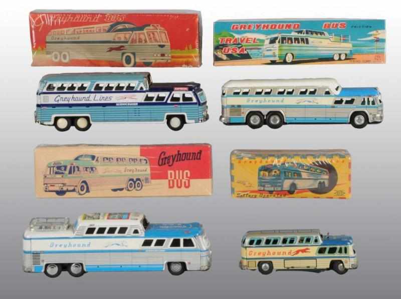 Appraisal: Lot of Tin Litho Greyhound Bus Toys Description Japanese Working