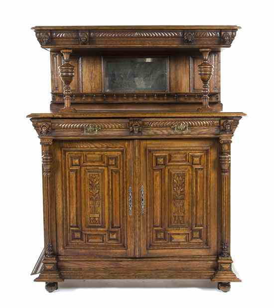 Appraisal: A Renaissance Revival Oak Server in two parts the superstructure