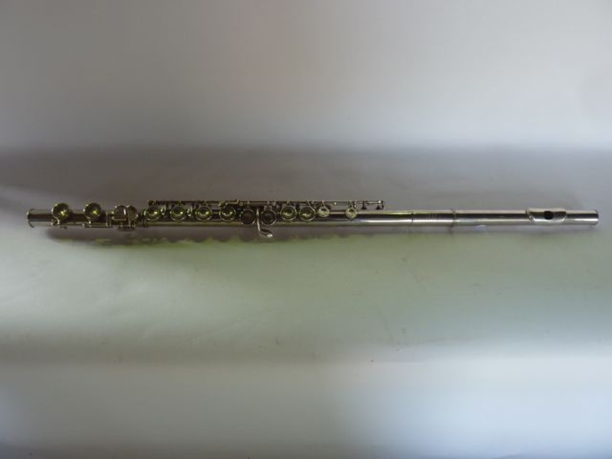 Appraisal: A vintage flute with stamped detail Romilliy Graduate made for