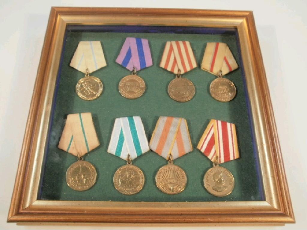 Appraisal: A collection of Russian military medals in a framed and