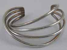 Appraisal: A Georg Jensen silver four strand bangle Jensen and marks