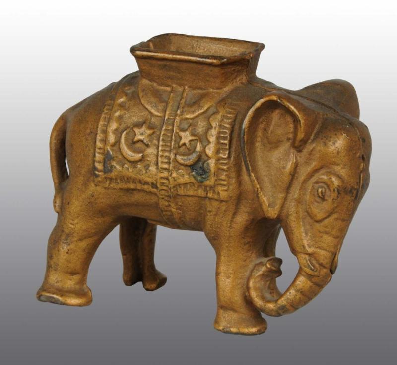 Appraisal: Cast Iron Elephant with Howdah Still Bank Description Manufactured by