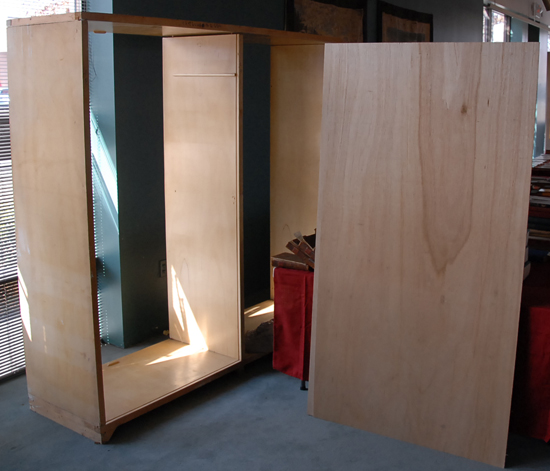 Appraisal: A Contemporary Double-side Wardrobe of pale woods the door fronts