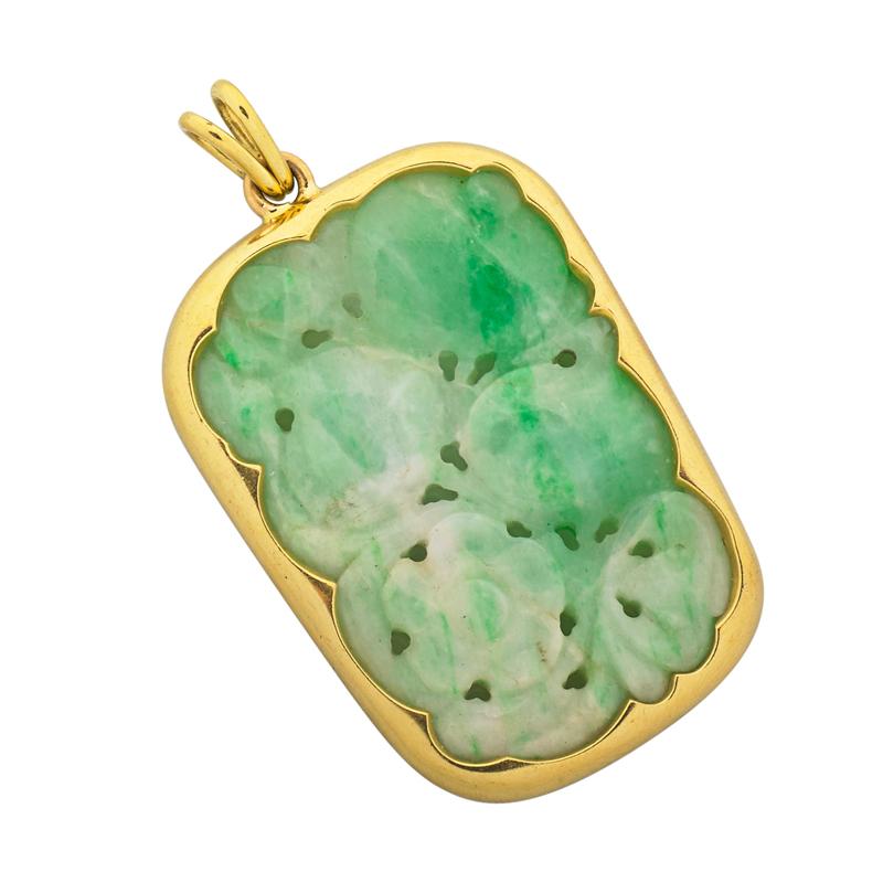 Appraisal: CARVED JADE K GOLD PENDANT Pierced fruit and floral carved