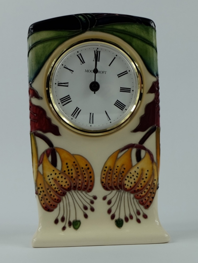 Appraisal: Moorcroft clock decorated in the Anna Lily design height cm