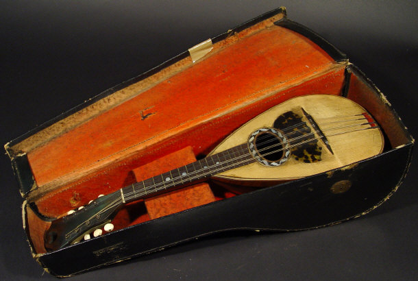 Appraisal: Melon shaped mandolin with strung back faux tortoiseshell panel and