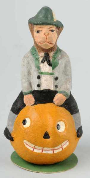 Appraisal: Monkey on Jack-O-Lantern Candy Container Description German Rare Closure on