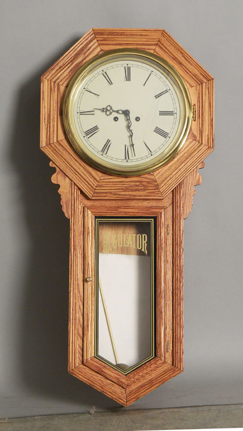 Appraisal: Reproduction oak wall clock