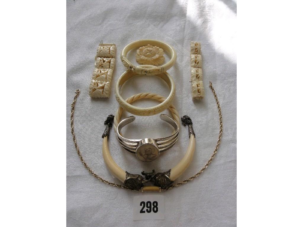 Appraisal: A collection of ivory jewellery including three bangles bracelets a