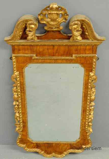 Appraisal: Georgian burl walnut mirror with gilt carved broken arch crest