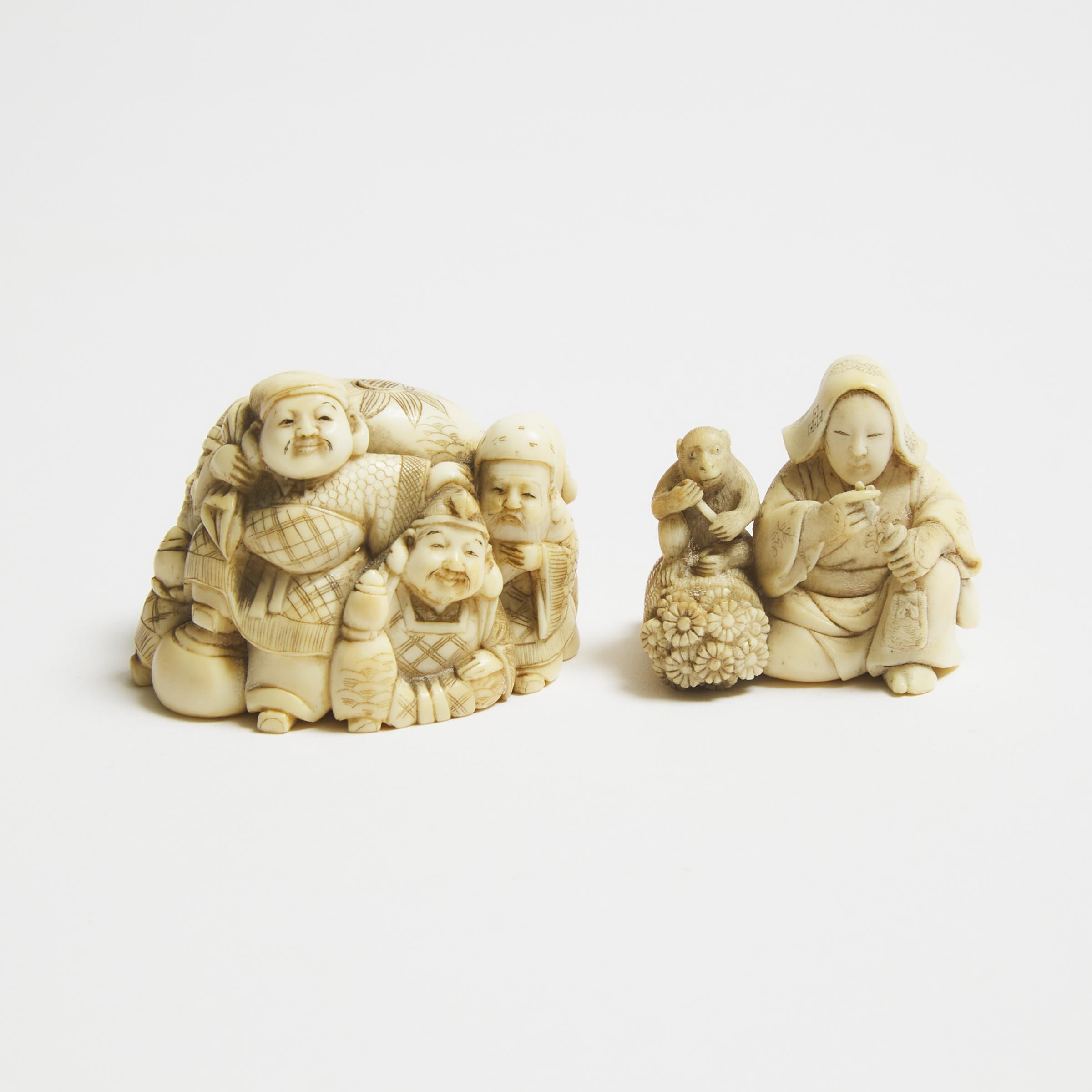 Appraisal: An Ivory Netsuke of a Lady and a Monkey Signed