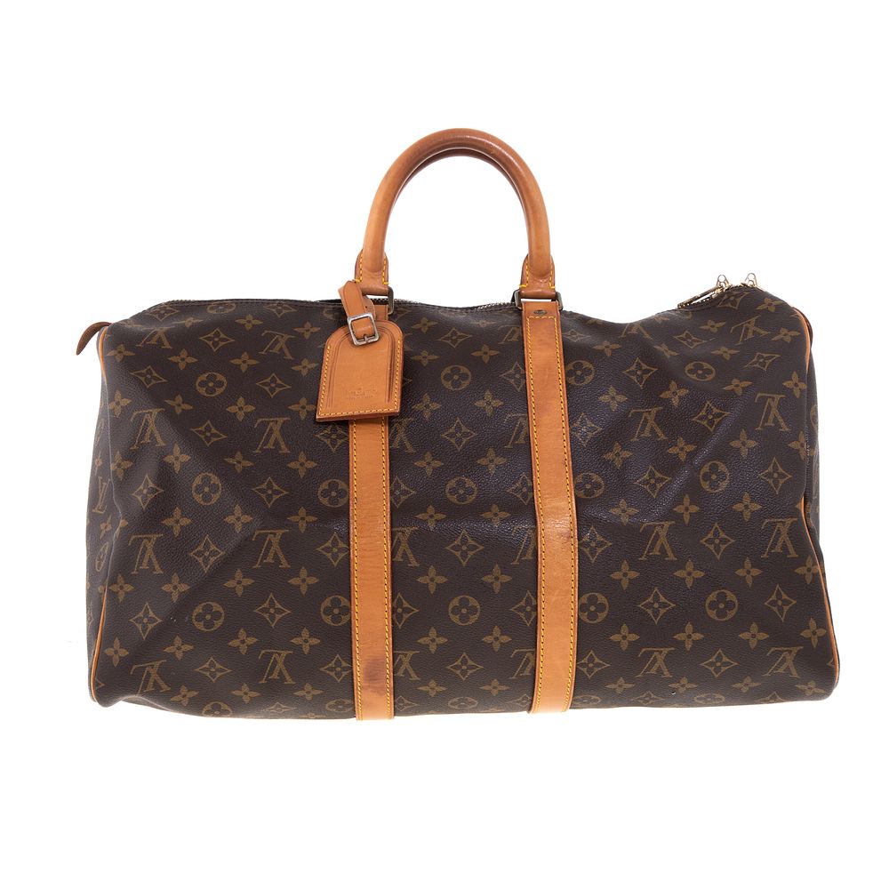 Appraisal: A Louis Vuitton Monogram Keepall A brown and tan Monogram