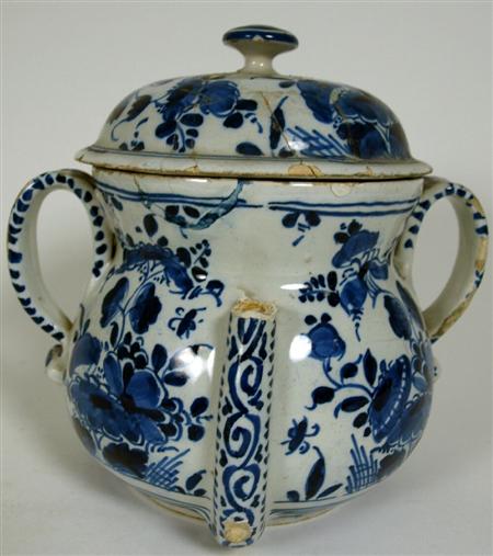 Appraisal: An early th century English Delft posset pot and cover