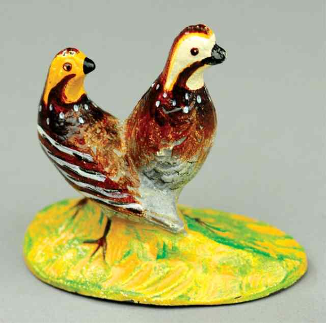 Appraisal: CAST IRON QUAIL PAPER WEIGHTS Hubley well cast depicts two