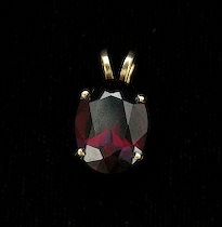 Appraisal: Ladies' Garnet Pendant Apprx ct oval-cut garnet prong set into