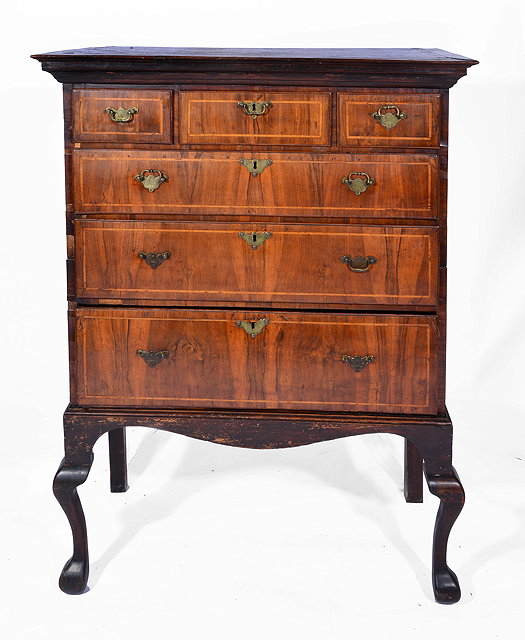 Appraisal: AN TH CENTURY WALNUT CHEST ON STAND of three short