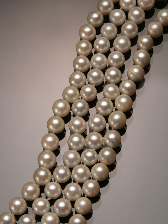 Appraisal: Opera Length Semi-Baroque Cultured Pearl Necklace Knotted The continuous single