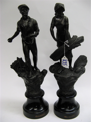 Appraisal: PAIR SPELTER FIGURES on round fitted bases titled L'Agriculture on