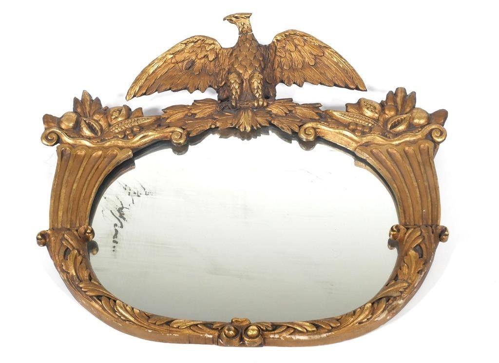 Appraisal: Federal gilt eagle and cornucopia oval framed mirror circa s