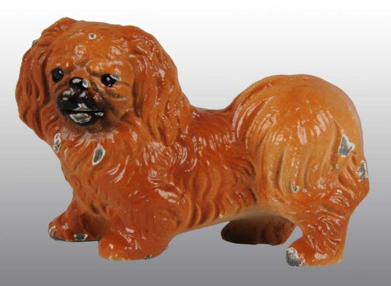 Appraisal: Cast Iron Hubley Pekingese Place Card Holder Description Cat Condition