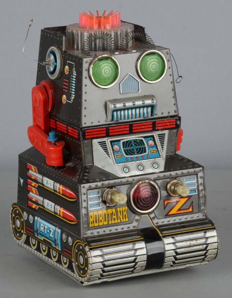 Appraisal: Nomura Tin Litho Battery-Op Robot Toy This Robotank-Z battery operated