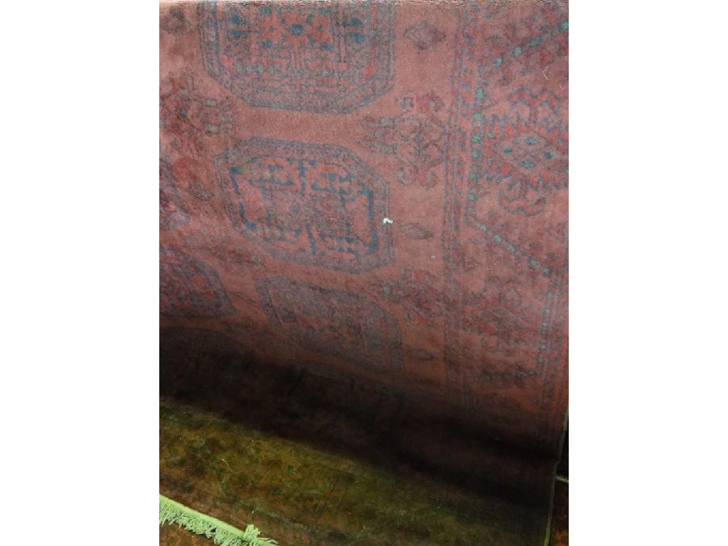 Appraisal: A Hamadan style carpet with three rows of elephant foot