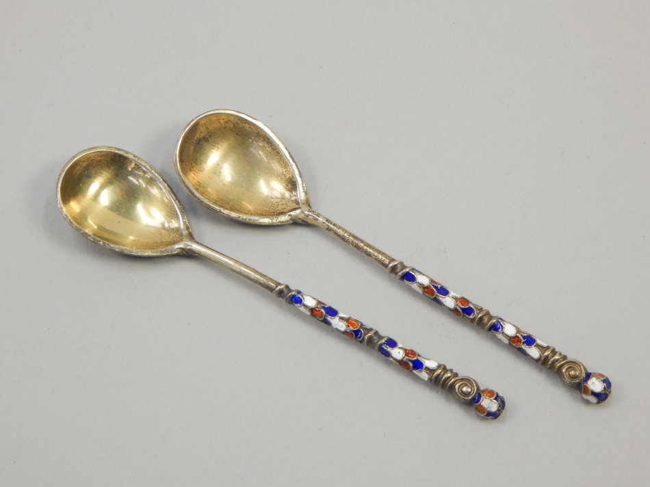 Appraisal: A pair of Russian white metal and champleve enamel spoons