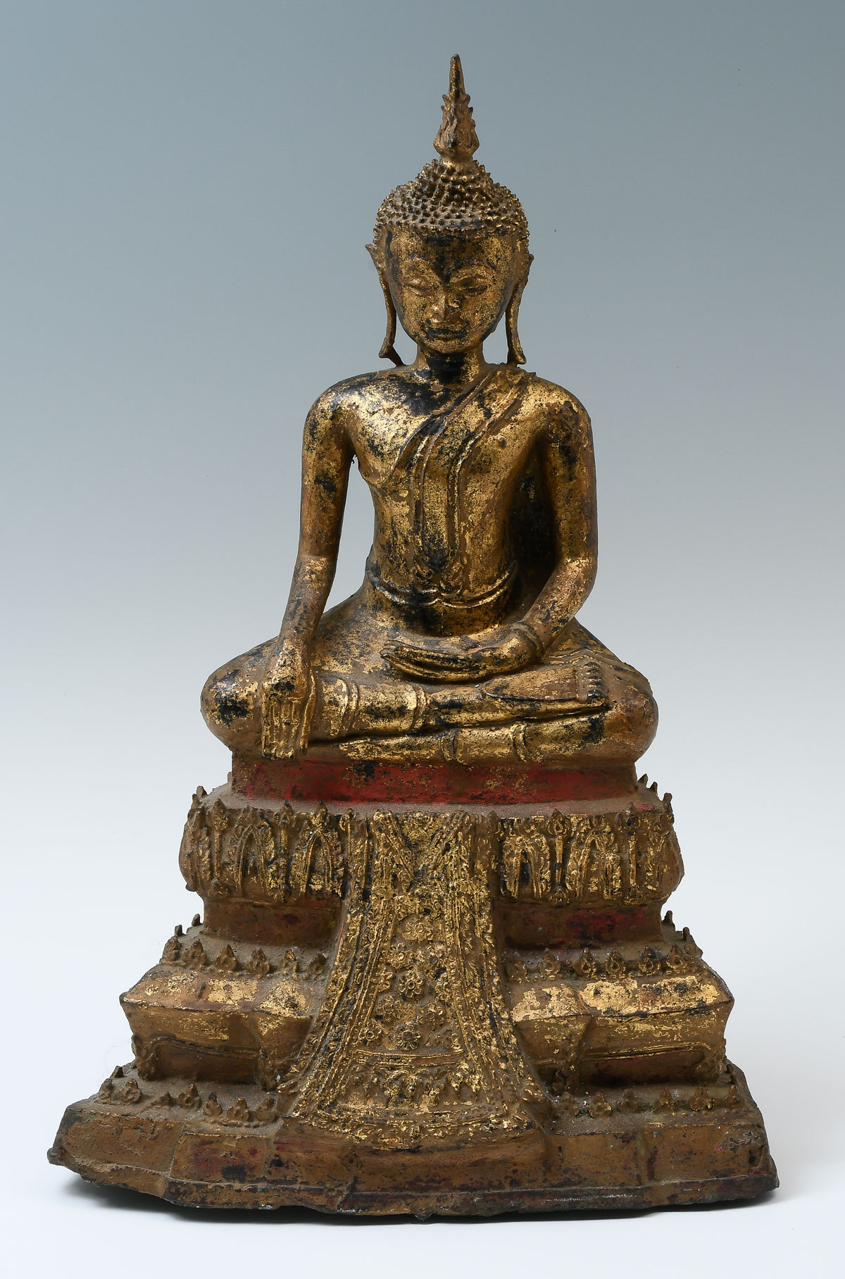 Appraisal: GILT BRONZE SEATED BUDDHA th possibly th century gilt cast