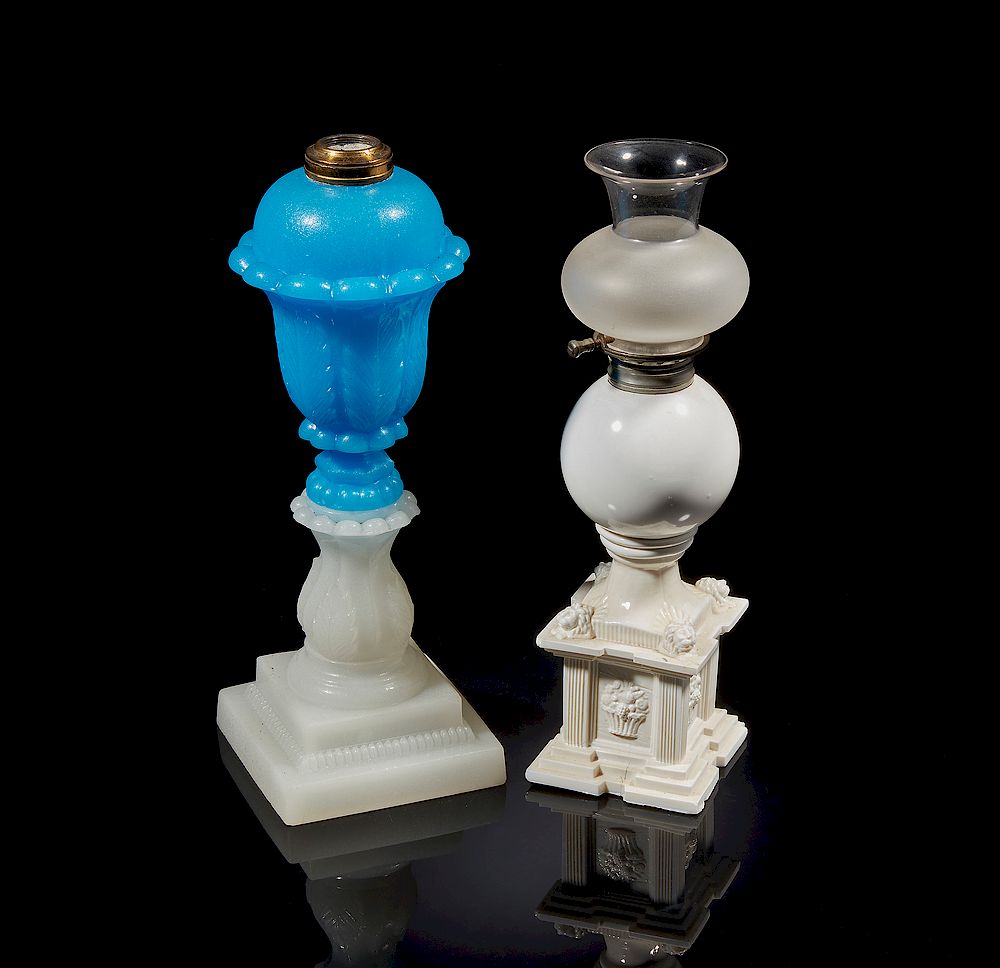 Appraisal: Two Glass Oil Lamps Two glass oil lamps one white