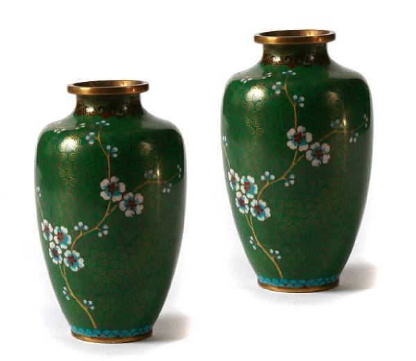 Appraisal: A pair of green cloisonne vases on bronze height in