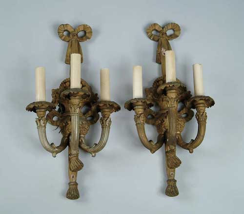 Appraisal: PAIR OF FRENCH-STYLE WALL SCONCES Gold painted triple arm wall