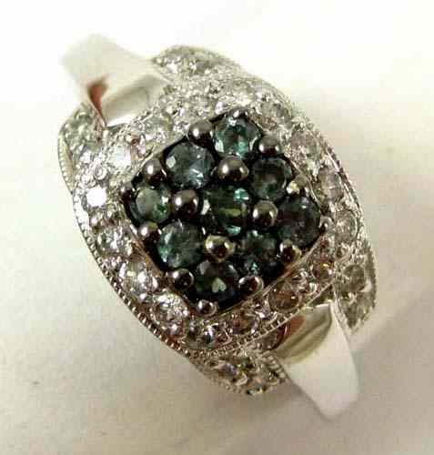 Appraisal: ALEXANDRITE AND DIAMOND RING k white gold set with round