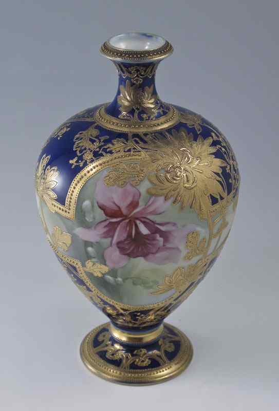 Appraisal: NIPPON HAND PAINTED PORCELAIN VASE Rare orchid design centered by