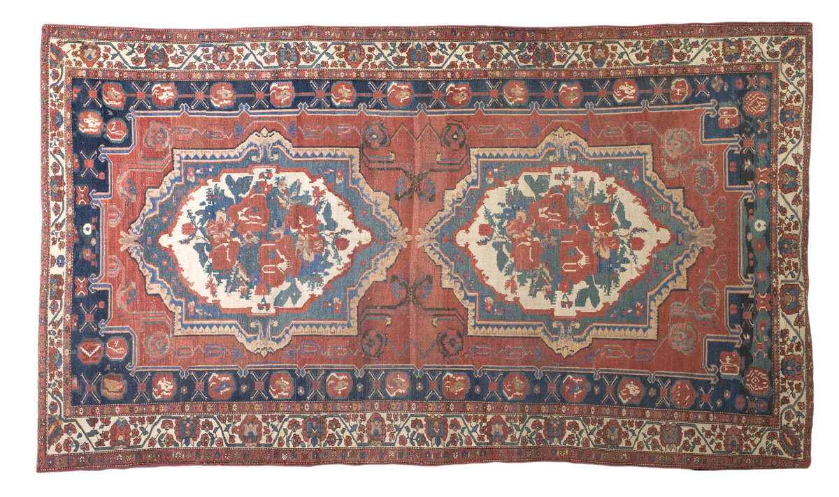 Appraisal: BAKTIARI CARPET WEST PERSIA The brick red field with two