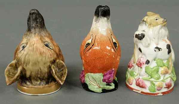 Appraisal: Three porcelain fox head stirrup cups th c each approx