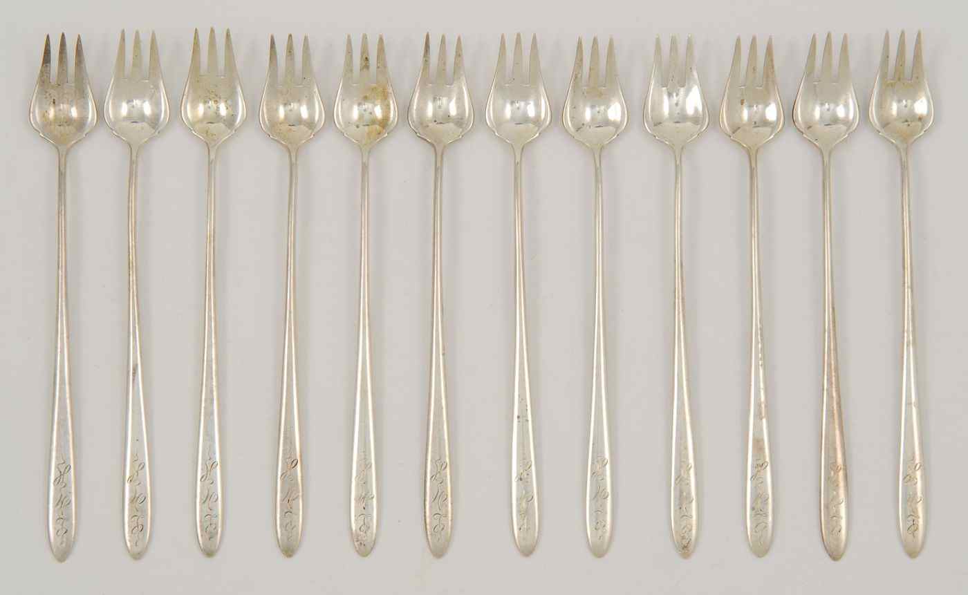 Appraisal: TWELVE TIFFANY STERLING SILVER COCKTAIL FORKSMonogrammed L M H ''