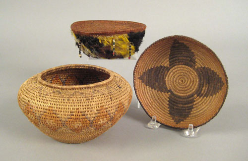 Appraisal: Pomo coiled basketry bowl with feather and bead decoration h