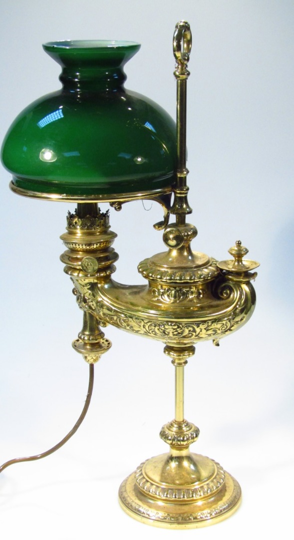 Appraisal: A thC Aladdin's brass table lamp surmounted by a cylindrical