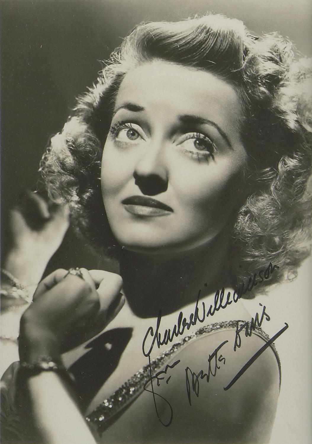 Appraisal: Bette Davis signed photograph A framed vintage publicity portrait inscribed