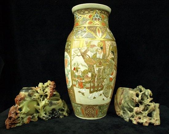 Appraisal: A Satsuma vase decorated panels with figures together with carved