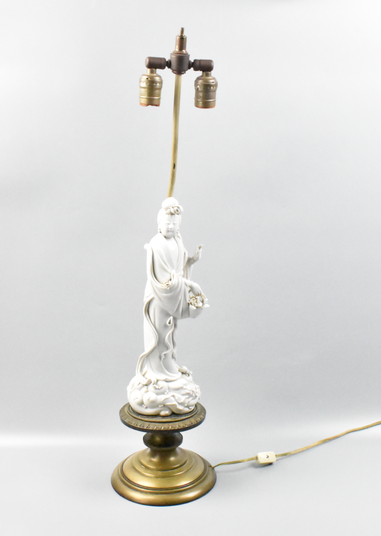 Appraisal: A Chinese blanc de chine porcelain lamp The Guanyin is